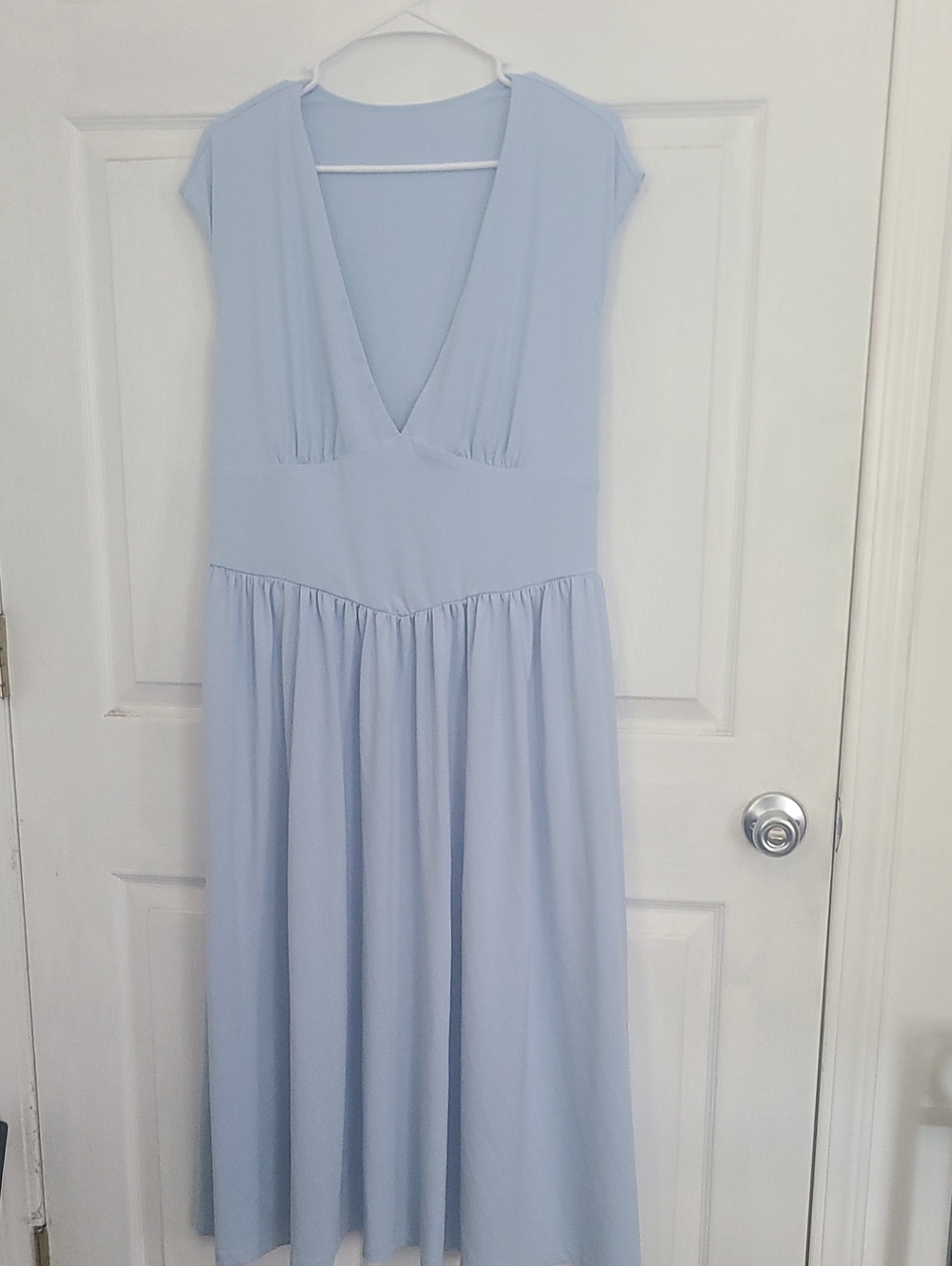 Elegant Light Blue Midi Dress with Deep V-Neck
